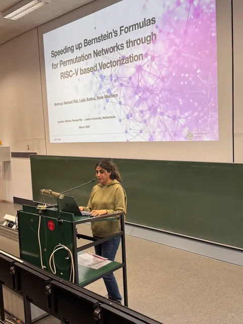 Mahnaz speaking at a technical event